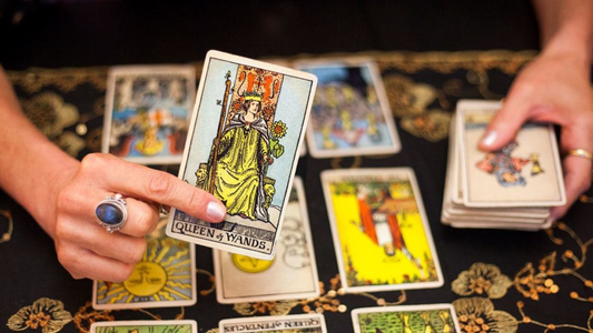 Reading Tarot Cards Featuring Queen of Wands