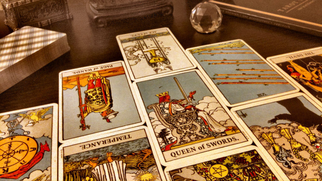 Tarot Cards Spread on Wooden Reading Table