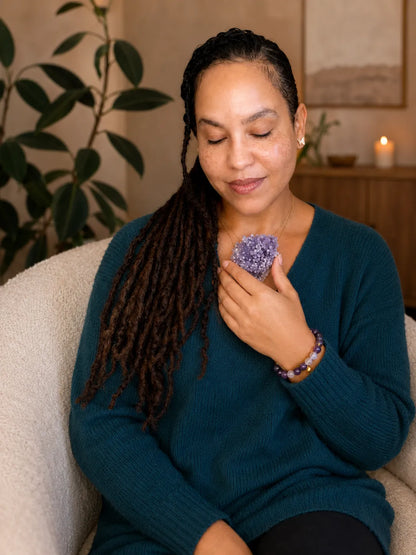 Holding Grape Agate to the heart while setting an intention