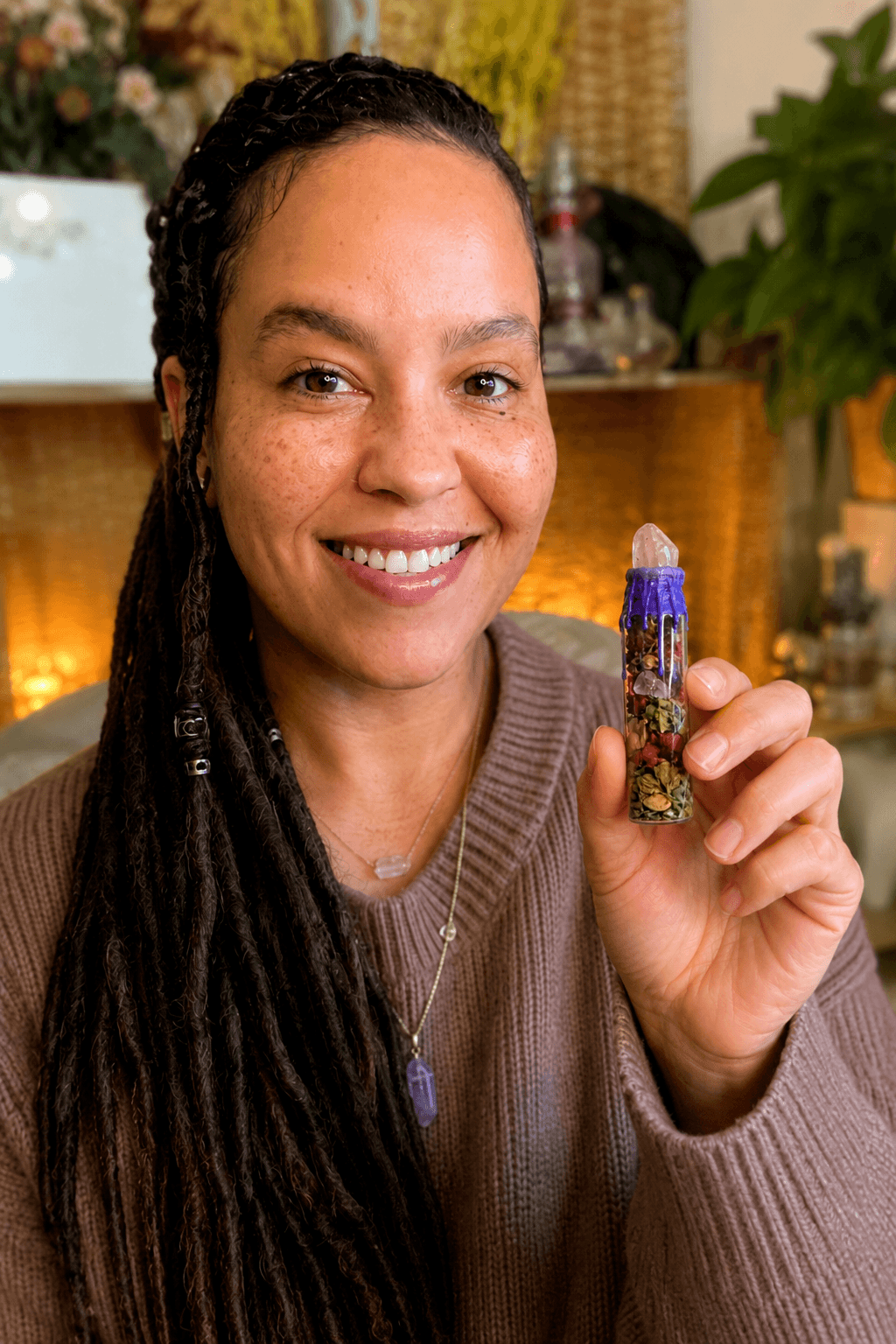 Dahlia holding the Devotion Spell Jar